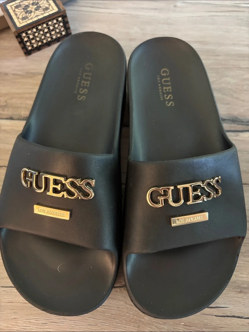 Women’s Guess platform slides